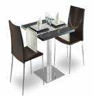 Chairs in chromed steel and imitation leather. Dim: 910x520x530mm